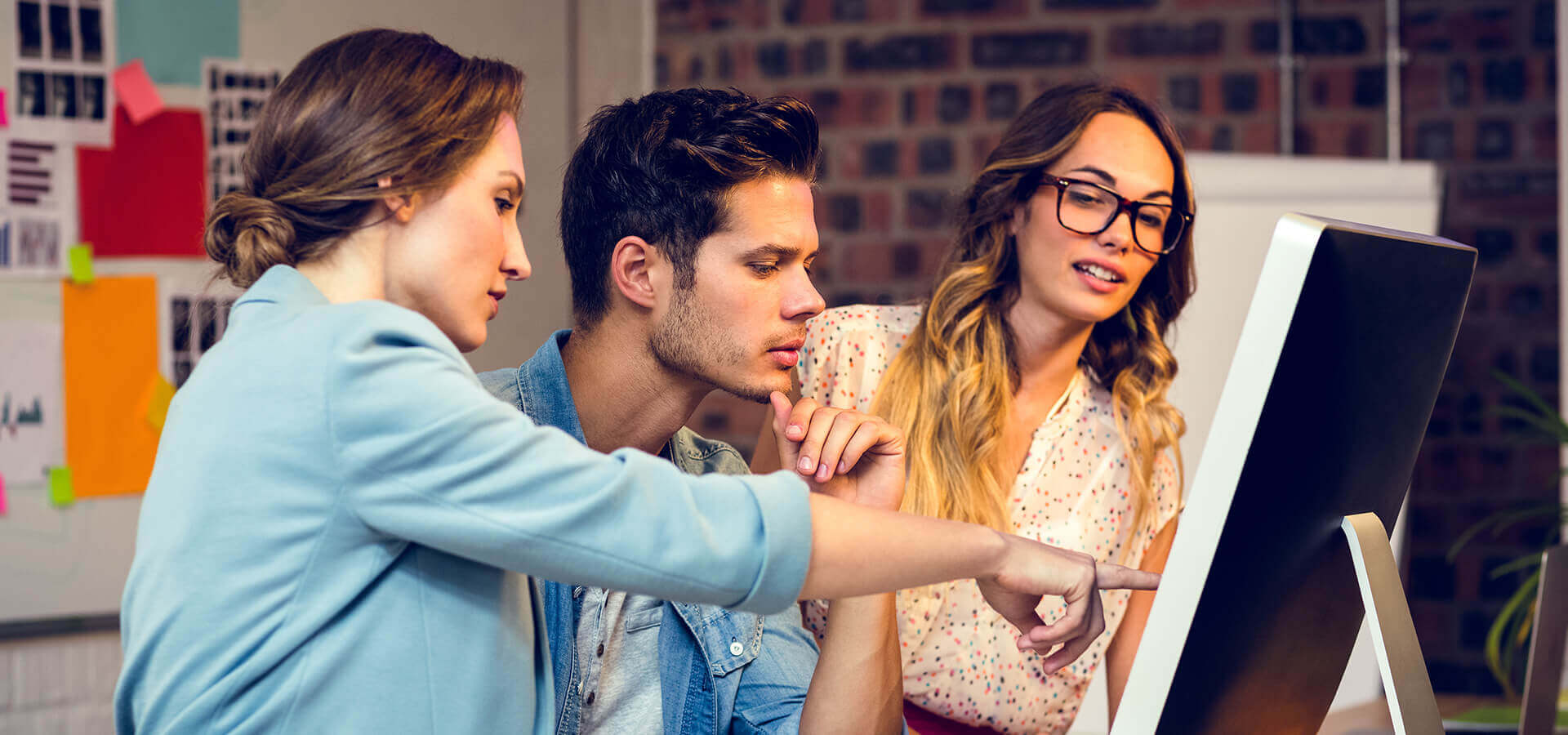 Team discussing compliance in an office